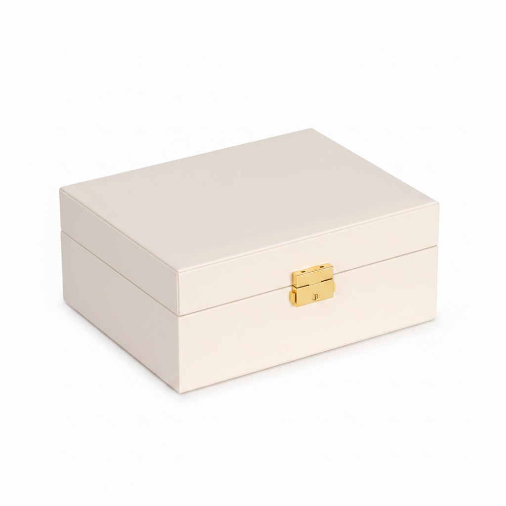 Ivory jewelry box with gold accents